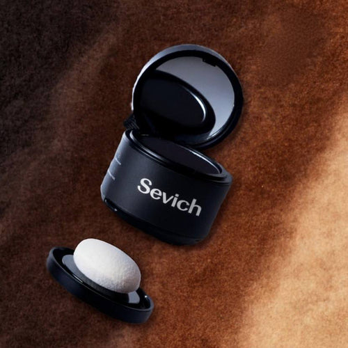 Black Sevich wireless earbuds in charging case on a brown textured surface