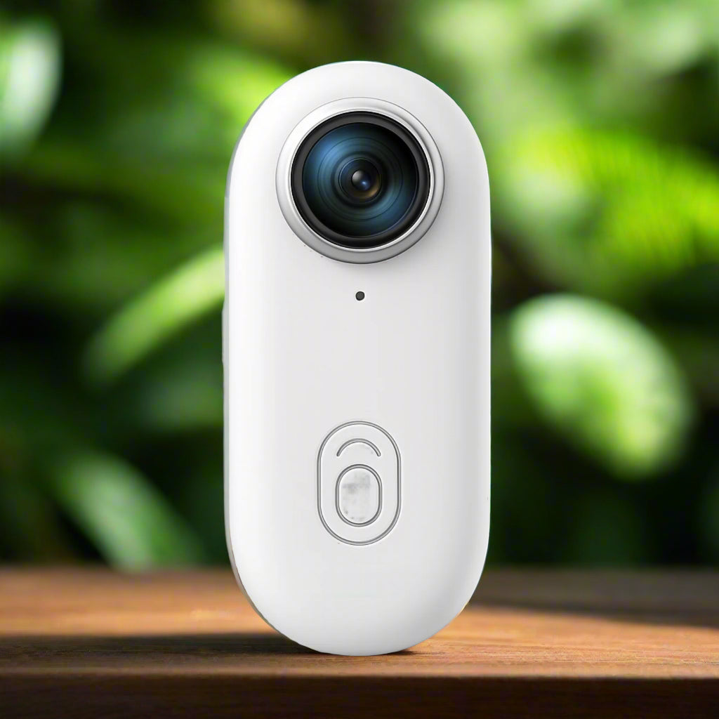 White camera with a blue lens on a white background